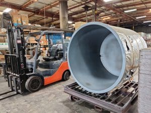 Powder Coating Facility with Metal Tank and Forklift